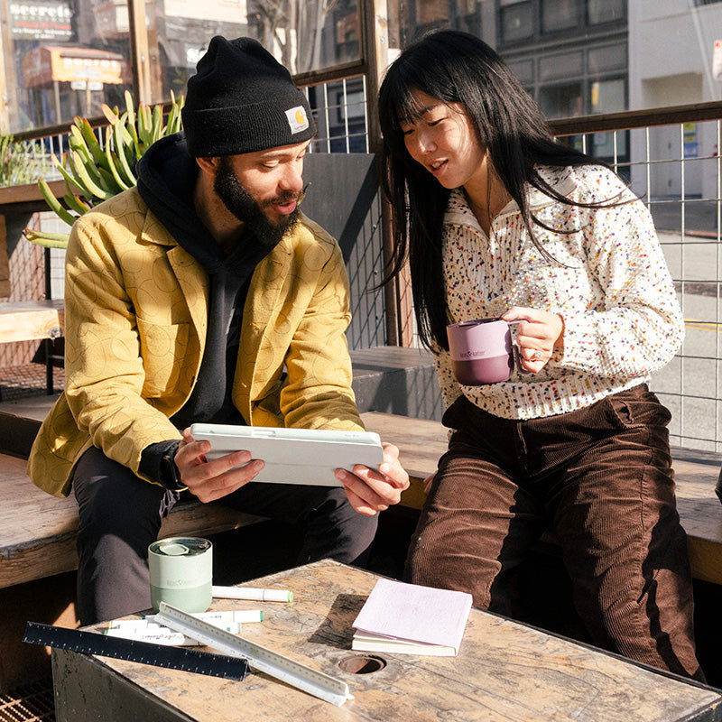 12oz-rise-mug-i8 12oz_rise_coffee_mug_dusty_orchid_couple_city_patio_square.jpg