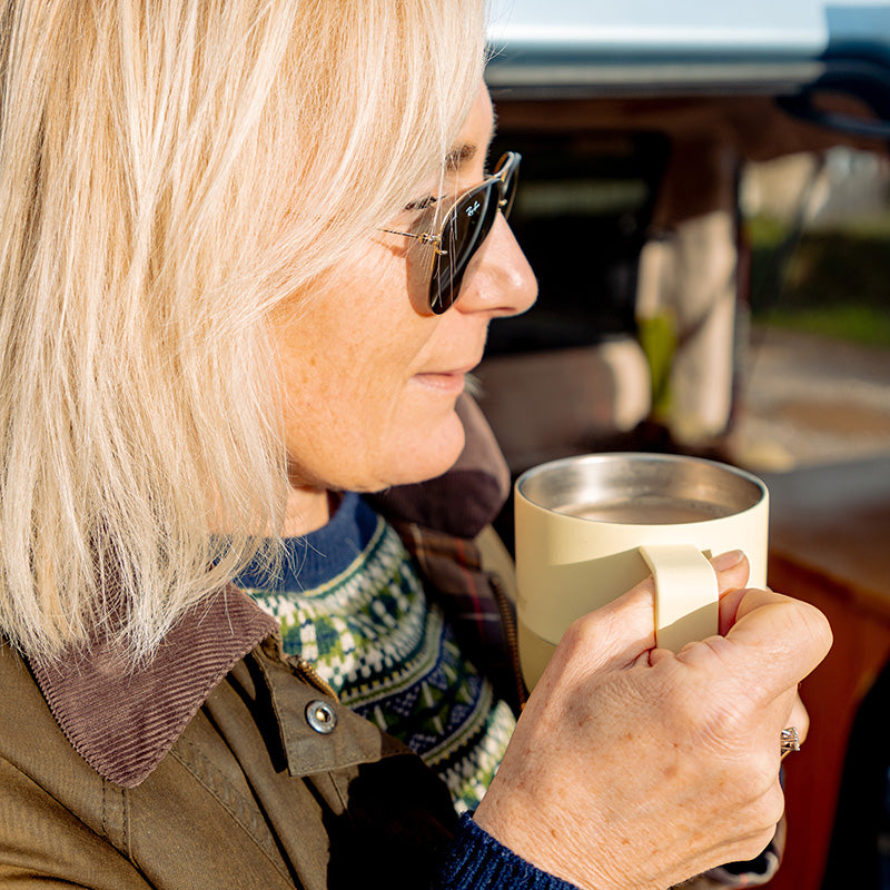 12oz-rise-mug-i8 12oz_rise_coffee_mug_wax_yellow_woman_drink_closeup_square.jpg