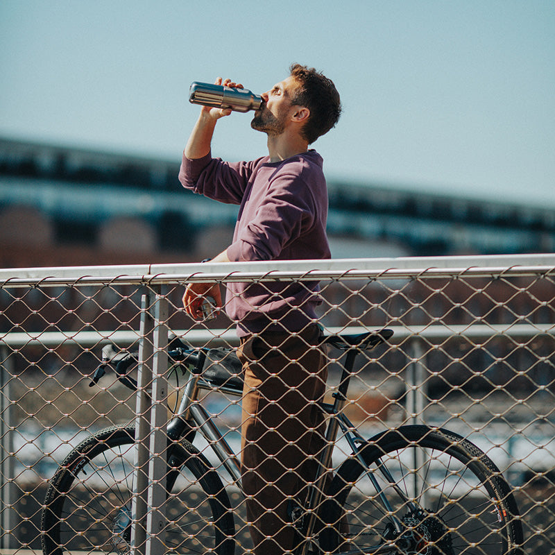 12oz-rise-reflect-with-bamboo-cap-l0 16oz_rise_reflect_man_bike_square.jpg
