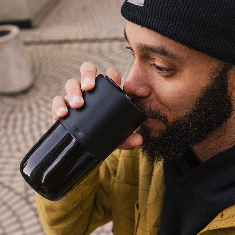 16oz-rise-tumbler-i2 16oz_rise_tumbler_black_man_drink_square.jpg