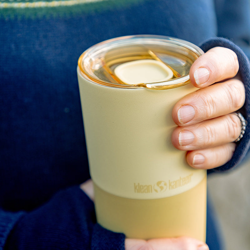 16oz-rise-tumbler-i2 16oz_rise_tumbler_wax_yellow_closeup_hand_lid_square.jpg