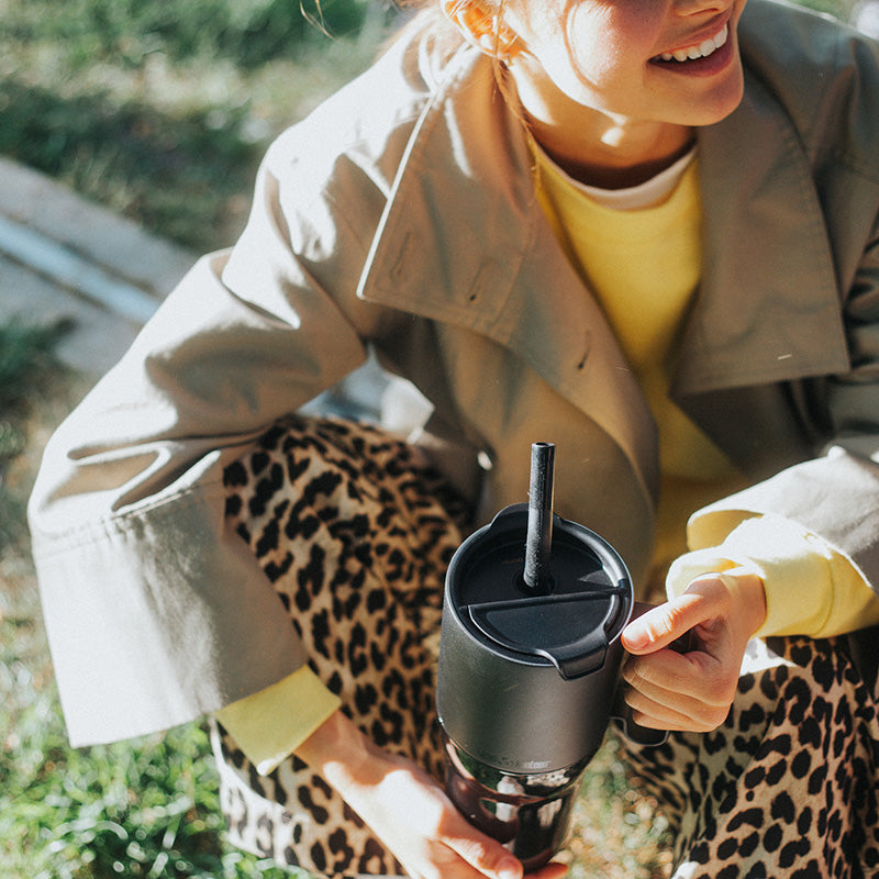 26oz-rise-tumbler-with-straw-lid-d9 26oz_rise_tumbler_black_woman_topview_square.jpg