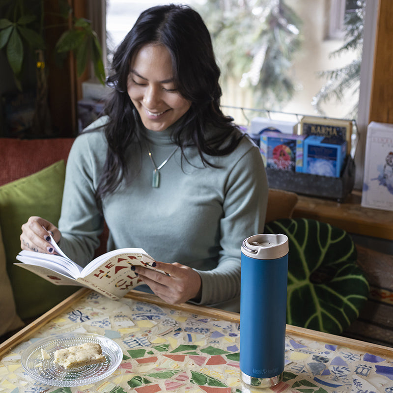 20oz-tkwide-with-cafe-cap-t7 tkwide_20oz_insulated_tumbler_cafe_woman_reading_square.jpg